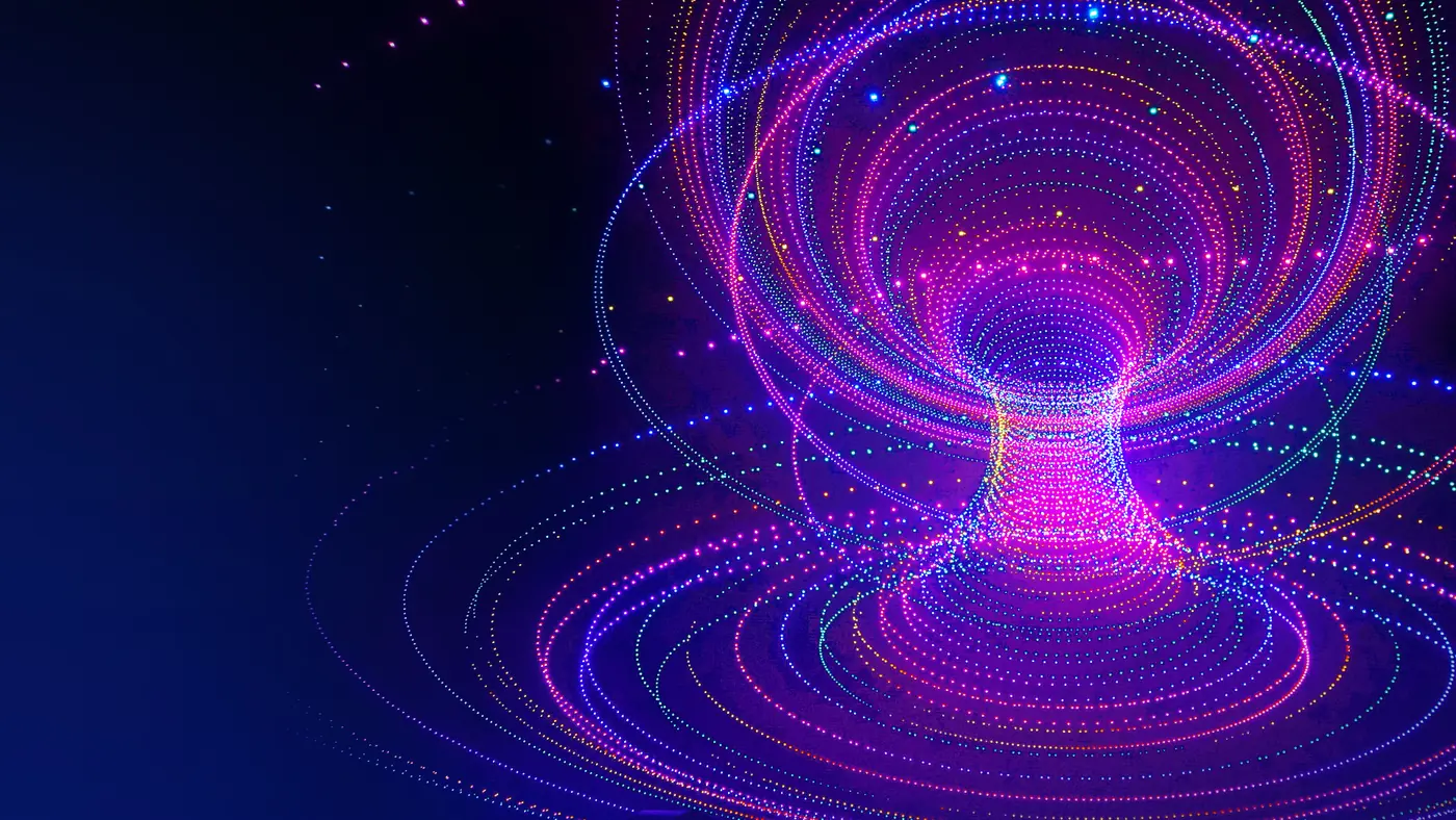 Vortex of magenta and violet light formed by drones in coordinated flight